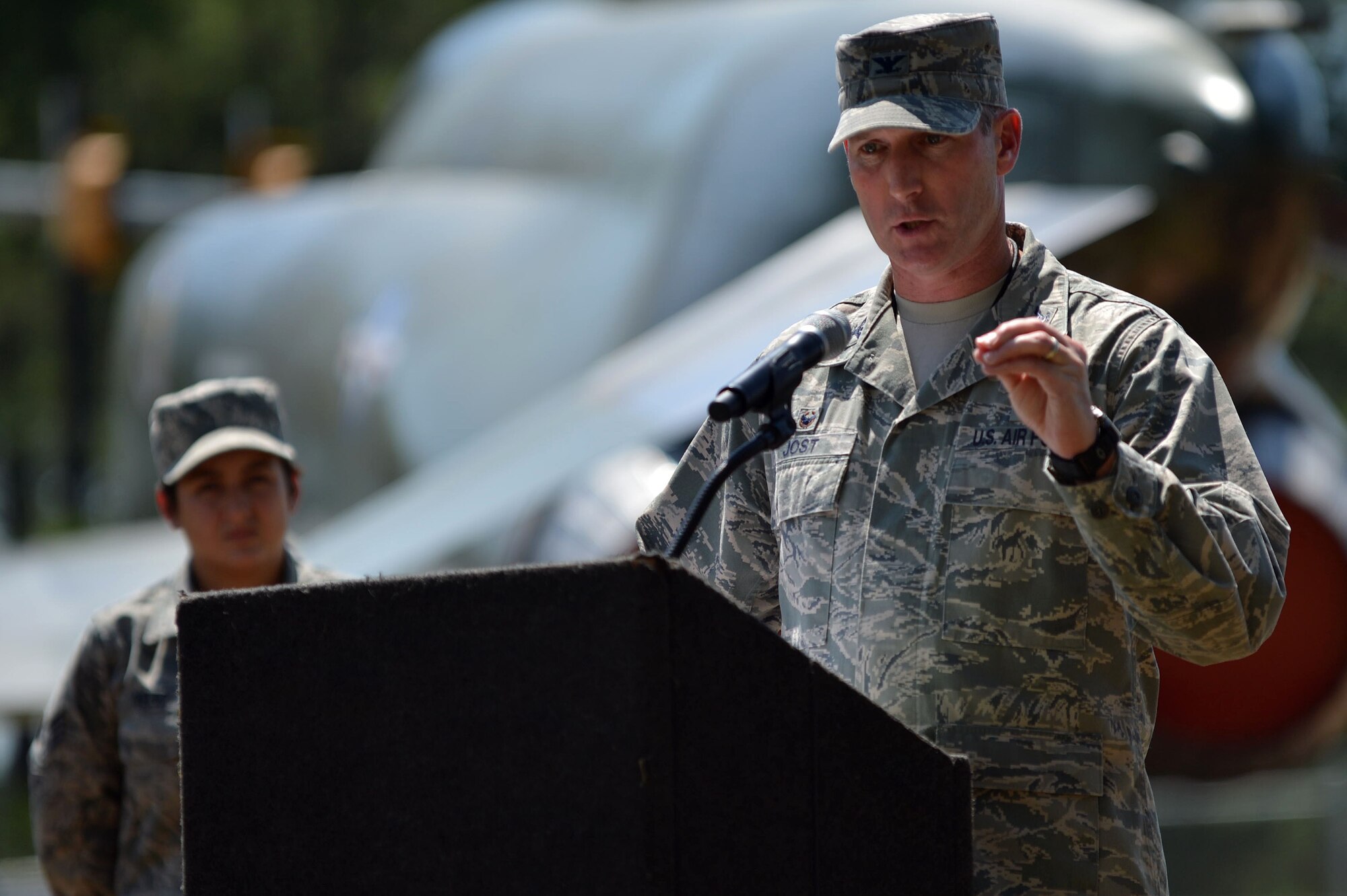 U.S. Air Force Col. Stephen Jost, 20th Fighter Wing commander, addresses members of Team Shaw and the local community during a road naming ceremony near the Sumter Gate at Shaw Air Force Base, S.C., July 14, 2016. In attendance was George Bowman, son of 1st Lt. Leroy Bowman, who the street was being named after. Bowman thanked everyone for their support and the honor of having a street named after his father. (U.S. Air Force photo by Senior Airman Michael Cossaboom)
