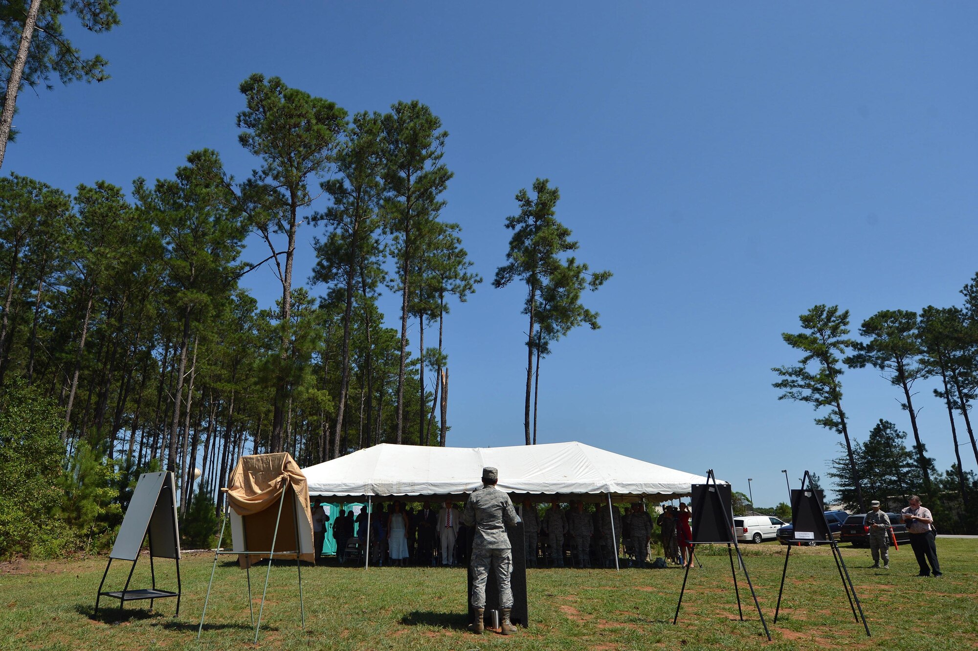Members of Team Shaw and the Sumter, S.C., community attend a road naming ceremony near the Sumter Gate on Shaw Air Force Base, S.C., July 14, 2016. The previously unnamed road was named in honor of Lt. Col. Willie Ashley and 1st Lt. Leroy Bowman who were both Sumter natives and Tuskegee Airmen who served in World War II. (U.S. Air Force photo by Senior Airman Michael Cossaboom)
