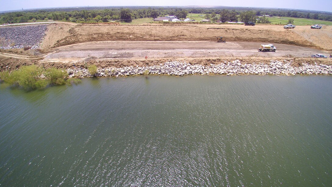 The Lewisville Lake Dam 161-foot Embankment slide repairs are well underway, placement of bedding and riprap on the access ramp continues. Estimated completion date is mid-August 2016.