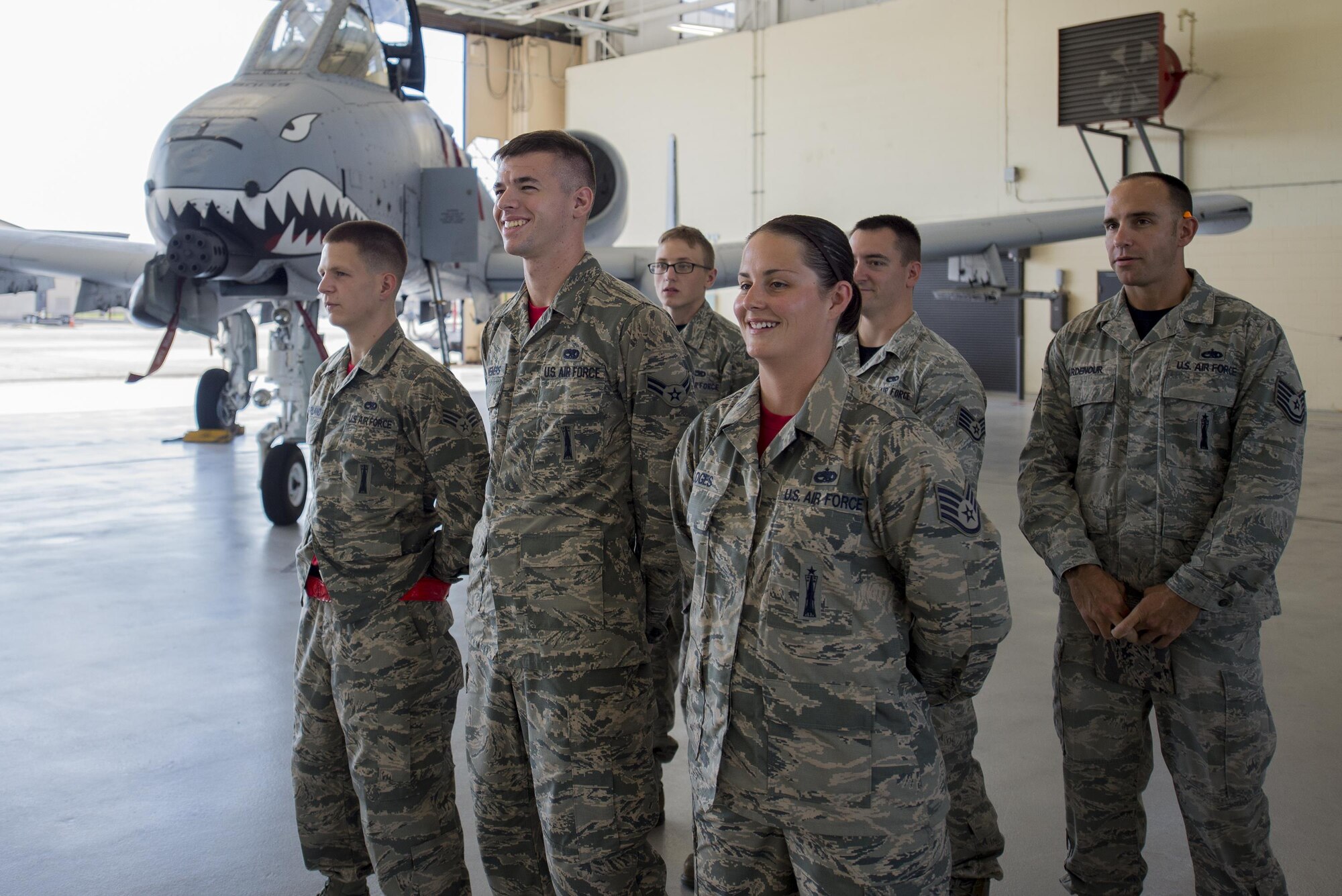 U.S. Air Force Airmen from the 75th Aircraft Maintenance Unit await the starting bell of a weapons load competition, July 15, 2016, at Moody Air Force Base, Ga. Load crews must first demonstrate their ability to load with minimal discrepancies in a safe, reliable and timely manner before being selected to compete in a load competition. (U.S. Air Force Photo by Airman Daniel Snider)