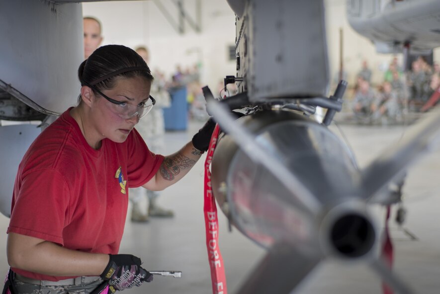 U.S. Air Force Staff Sgt. Cecil Loges, 75th Aircraft Maintenance Unit load crew member, checks the bolts holding an MK-82 Low Drag training bomb to an A-10C Thunderbolt II during a load competition, July 15, 2016, at Moody Air Force Base, Ga. Loges’ primary duty was to review checklists and ensure her team performs procedures correctly in a timely manner. (U.S. Air Force Photo by Airman Daniel Snider)   