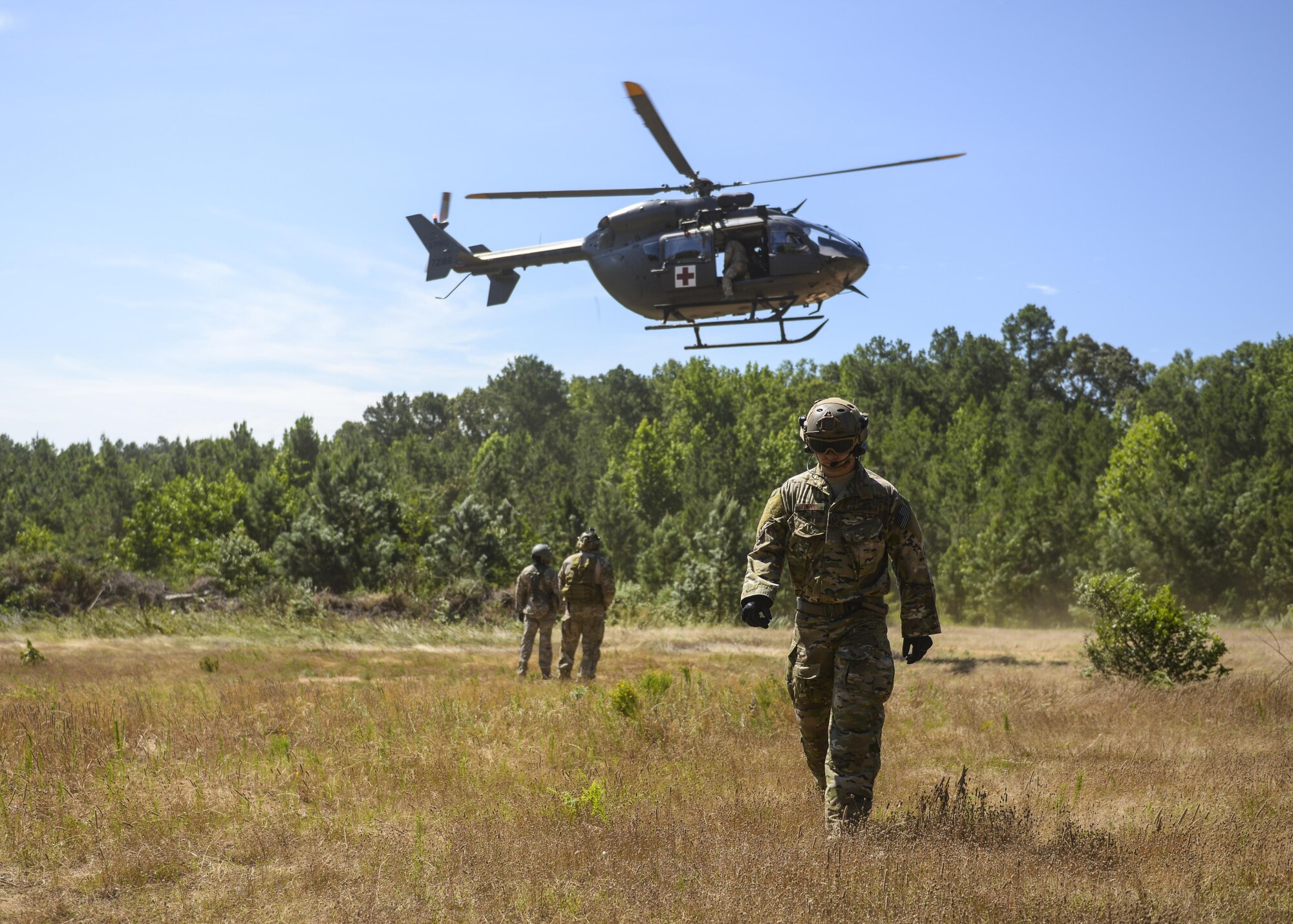 U.S. Air Force Tech. Sgt. Jerrod Mink, 19th Operations Group survival, evasion, resistance and escape specialist recovers after conducting hoist training June 27, 2016, at Little Rock Air Force Base, Ark. Air Mobility Command SERE specialists underwent training on how to load personnel to a UH-72 Lakota rescue hoist seat. (U.S. Air Force photo by Senior Airman Mercedes Taylor)