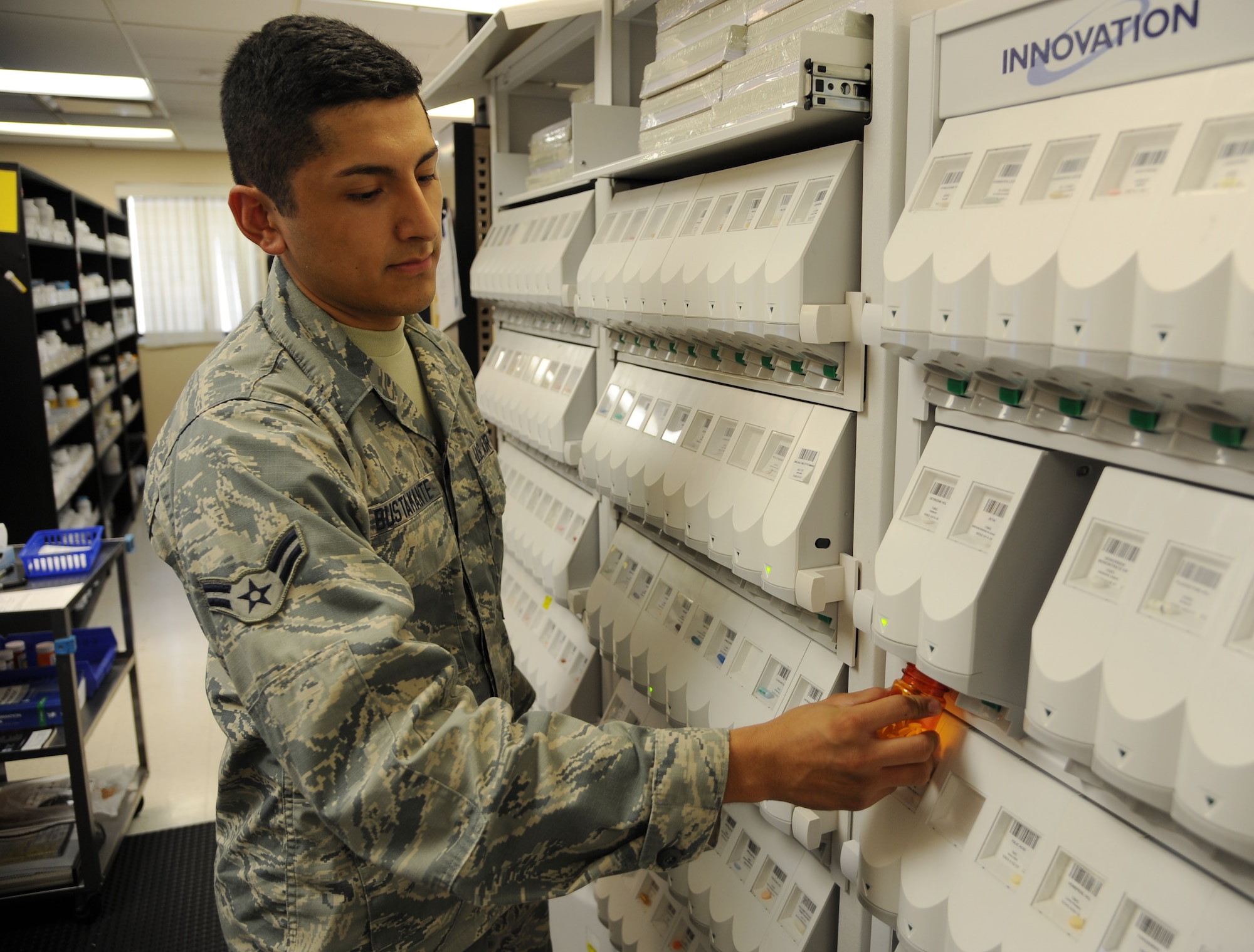 Airman 1st Class Alan Bustamante, a pharmacy technician assigned to the 6th Medical Group, fills a patient’s prescription at the PharmaCARE center at MacDill Air Force Base, Fla., July 12, 2016. The PharmaCARE center at MacDill is the busiest outpatient prescription center in the Air Force and fills approximately 156,000 prescriptions per year. (U.S. Air Force photo by Airman Adam R. Shanks)