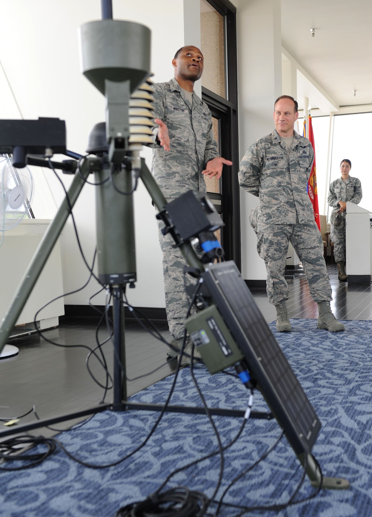 Tech. Sgt. Jonathan Winston, 335th Training Squadron instructor, briefs Col. Todd Weyerstrass, 2nd Air Force vice commander, on the weather training course at the Weather Training Facility during an 81st Training Wing orientation tour July 12, 2016, on Keesler Air Force Base, Miss. The purpose of the tour was to become familiar with the wing’s mission, operations and personnel. (U.S. Air Force photo by Kemberly Groue/Released)