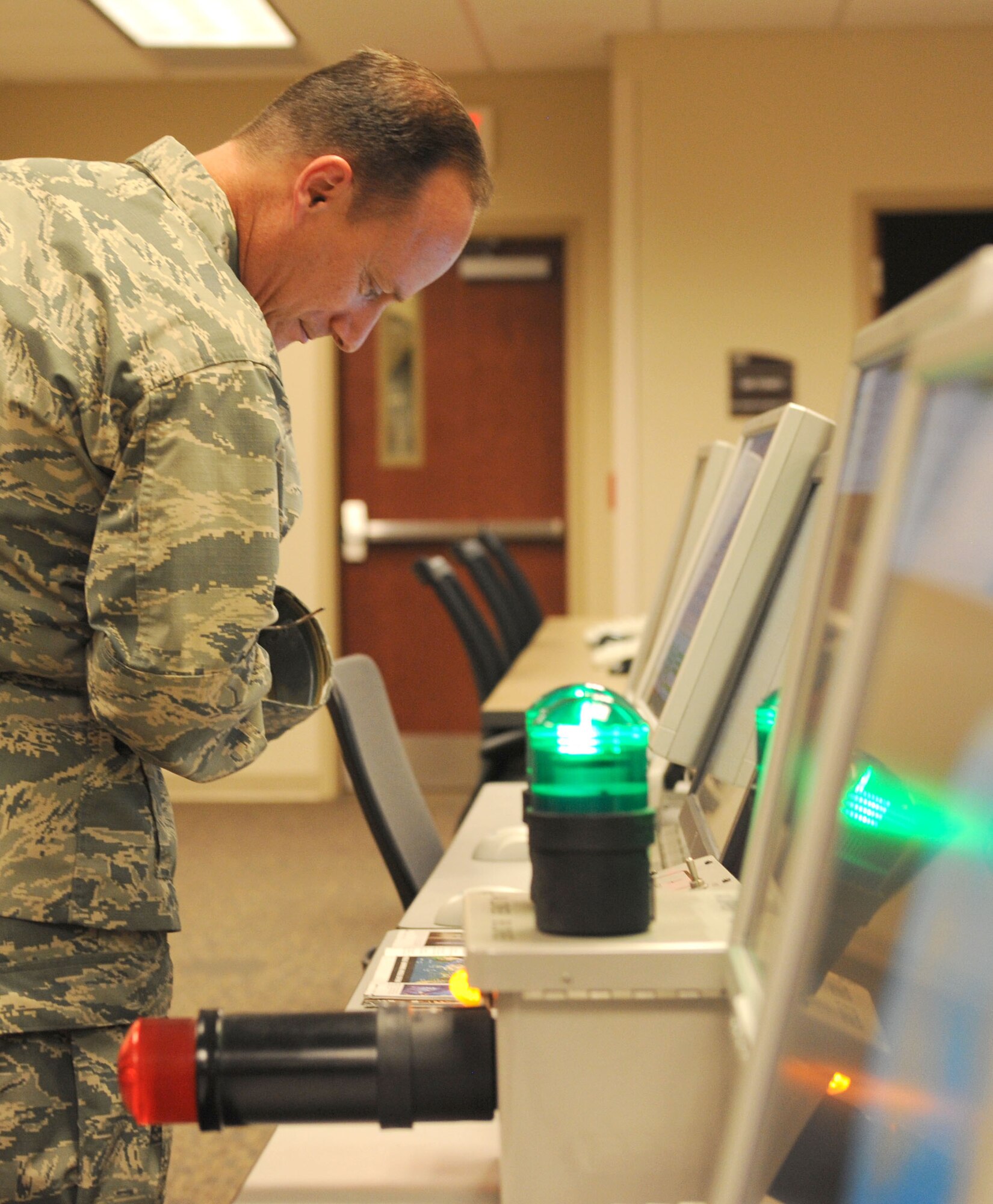 Col. Todd Weyerstrass, 2nd Air Force vice commander, views SIMWARE developed by the 81st Training Support Squadron’s trainer development center during an 81st Training Wing orientation tour July 12, 2016, on Keesler Air Force Base, Miss. The purpose of the tour was to become familiar with the wing’s mission, operations and personnel. (U.S. Air Force photo by Kemberly Groue/Released)