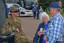 Capt. Robert Meeks, 40th Helicopter Squadron UH-1N Iroquois pilot, left, speaks with members from the United States Air Force Helicopter Pilot Association at Sun Plaza Park July 14, 2016, at Malmstrom Air Force Base, Mont. The USAFHPA visited Malmstrom to have lunch as part of their annual reunion. (U.S. Air Force photo/Airman 1st Class Daniel Brosam)