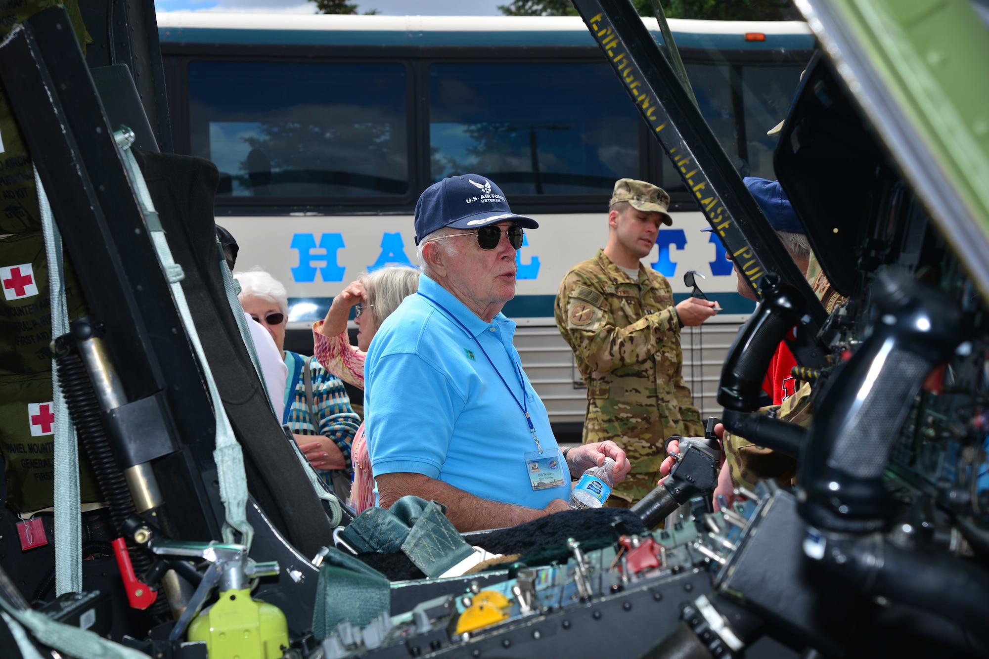 A member of the United States Air Force Helicopter Pilot Association inspects a UH-1N Iroquois at Sun Plaza Park, July 14, 2016, at Malmstrom Air Force Base, Mont. The 40th Helicopter Squadron provided a static display for the guests to look at while visiting the base. (U.S. Air Force photo/Airman 1st Class Daniel Brosam)