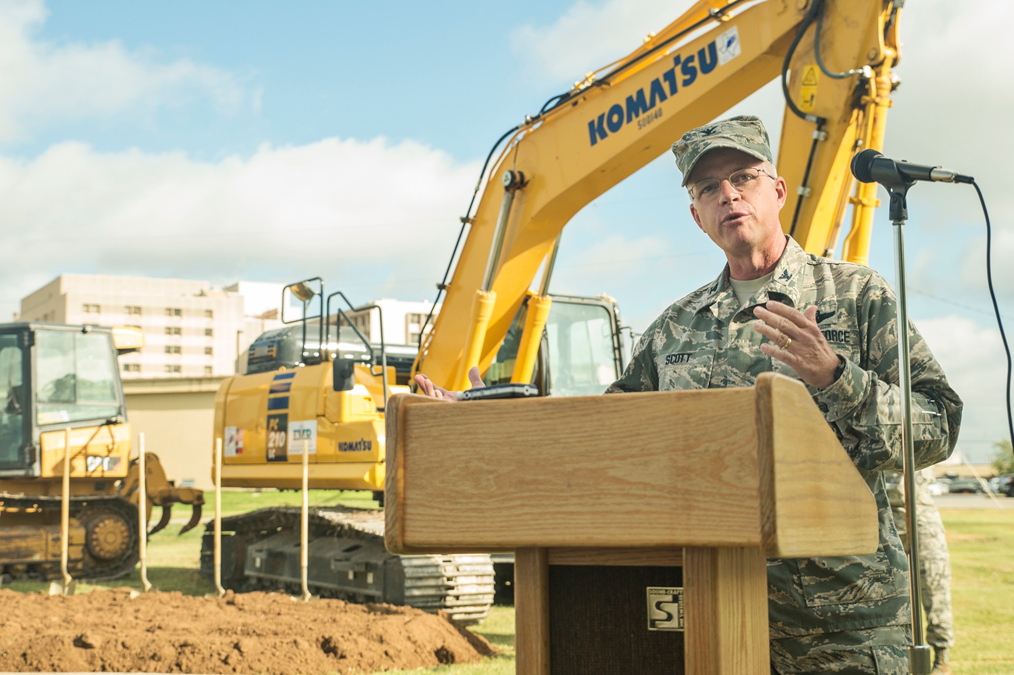 Col. David Scott, 433rd Airlift Wing vice commander, speaks at the ground breaking ceremony at the future site of the 433rd Medical Group Consolidated Training Facility July 14, 2016 at Joint Base San Antonio-Lackland, Texas. This new building will be a two-story, 36,560-square-feet facility that will combine 433rd Medical Group units who have been previously displaced across JBSA-Lackland. (U.S. Air Force photo by Benjamin Faske) 
