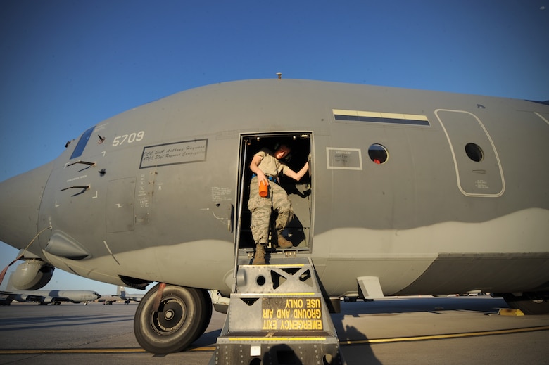 Senior Airman Timothy Thomasula, a maintainer assigned to the 923rd Aircraft Maintenance Squadron, Davis-Monthan Air Force Base, Ariz., performs pre-flight checks on an HC-130J Combat King II prior to a Red Flag 16-3 night training mission July 13, 2016 at Nellis AFB, Nev. The HC-130J is an extended-range version of the C-130J Hercules transport. Its mission is to rapidly deploy and execute combatant commander directed recovery operations to austere airfields and denied territory for expeditionary, all weather personnel recovery operations, and forward area ground refueling missions. (U.S. Air Force photo by Senior Airman Joshua Kleinholz/Released)