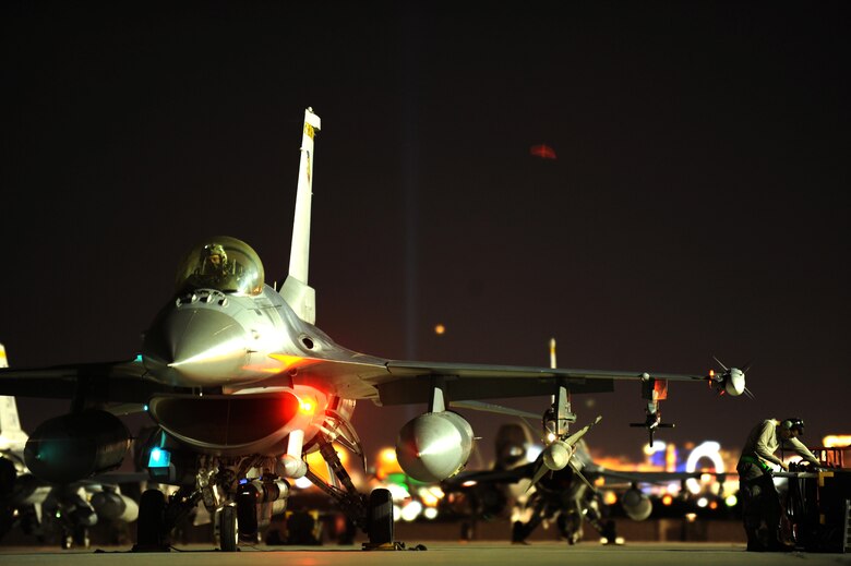 An F-16-CJ from the 79th Fighter Squadron, Shaw Air Force Base, S.C., receives final preparations prior to a Red Flag 16-3 night training mission July 13, 2016 at Nellis AFB, Nev. The night operations aspects of Red Flag is crucial for aircrews looking to gain experience in low-light situations, giving U.S. and coalition Air Forces the strategic upper hand in current and future conflicts. (U.S. Air Force photo by Senior Airman Joshua Kleinholz/Released)