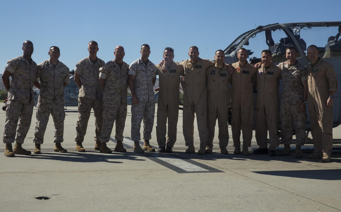 Maj. Gen. Michael Rocco, commanding general of 3rd Marine Aircraft Wing, poses for a picture with leaders from Marine Aircraft Group (MAG) 39 after his last flight aboard Marine Corps Air Station Camp Pendleton, Calif., July 7, 2016. Rocco took command of 3rd MAW in June 2014 and is slated to relinquish command to Maj. Gen. Mark Wise on July 22, 2016. (U.S. Marine Corps photo by Pfc. Jake McClung/Released)