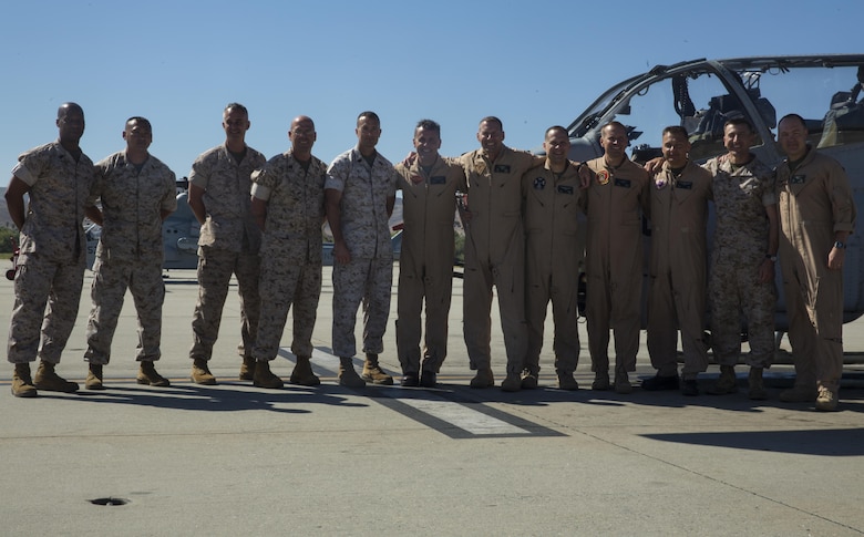 Maj. Gen. Michael Rocco, commanding general of 3rd Marine Aircraft Wing, poses for a picture with leaders from Marine Aircraft Group (MAG) 39 after his last flight aboard Marine Corps Air Station Camp Pendleton, Calif., July 7, 2016. Rocco took command of 3rd MAW in June 2014 and is slated to relinquish command to Maj. Gen. Mark Wise on July 22, 2016. (U.S. Marine Corps photo by Pfc. Jake McClung/Released)