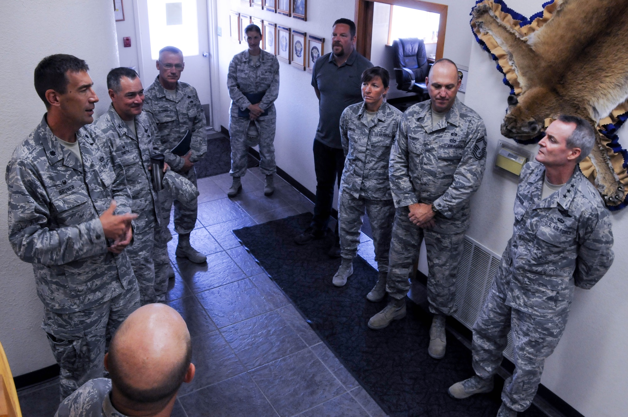 U.S. Air Force Lt. Gen. Darryl Roberson, commander of Air Education and Training Command, far right, visits with members of the 173rd Civil Engineer Squadron at Kingsley Field, Ore., July 7, 2016. Roberson had a firsthand look at the unit's mission and capabilities, which include training F-15C fighter pilots. (U.S. Air National Guard photo by Staff Sgt. Penny Snoozy)