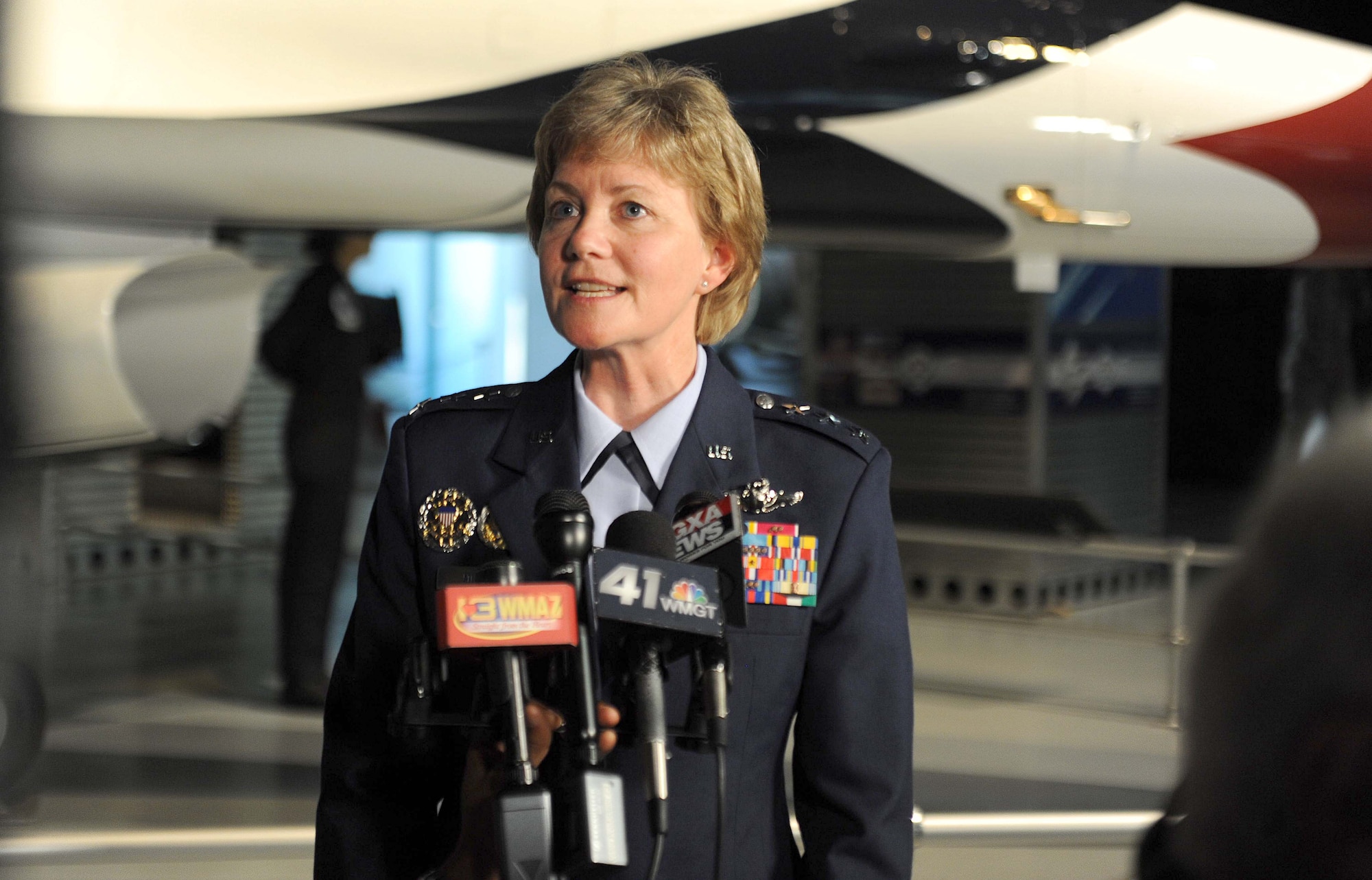 Lt. Gen. Maryanne Miller, speaks to the media following the Air Force Reserve Command change of command ceremony at the Museum of Aviation Century of Flight Hangar July 15, 2016. Miller, who took command of AFRC, is the first female Citizen Airman to hold the position. She is also the first female Citizen Airman to achieve the rank of lieutenant general. (U.S. Air Force photo by Tommie Horton)