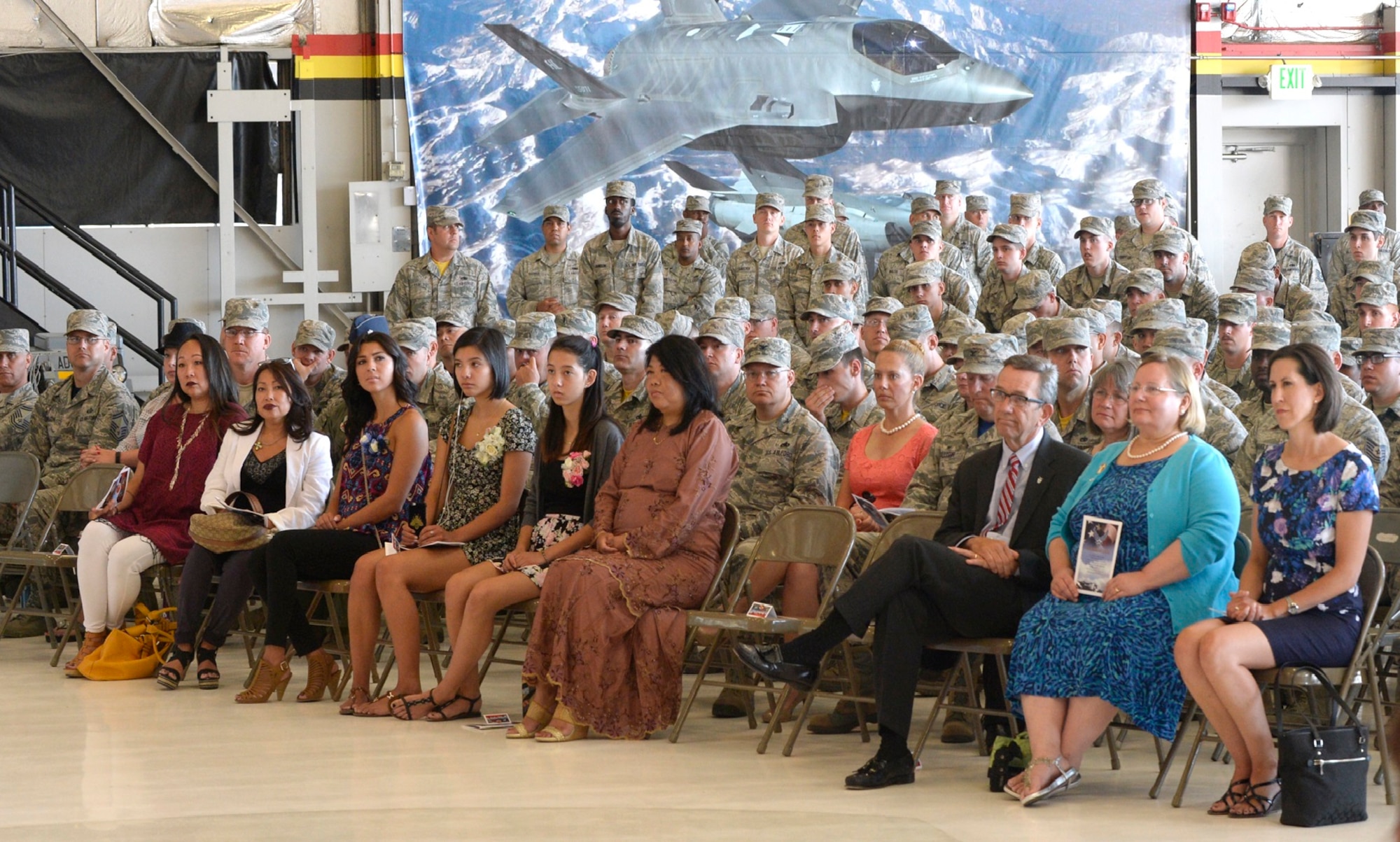 Airmen and civilians watch as command of the 388th Maintenance Group changes July 15 at Hill Air Force Base. During the ceremony, Col. Brian Fox relinquished command of the group while Col. Michael Miles assumed its highest leadership position. (U.S. Air Force photo by Todd Cromar)
