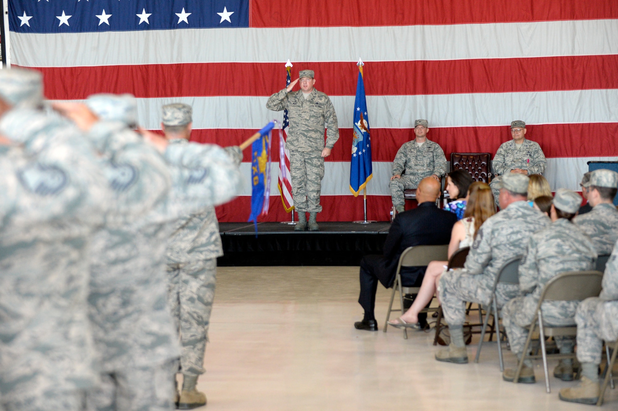 Col. Michael Miles receives his first salute as 388th Maintenance Group commander during a change of command ceremony July 15 at Hill Air Force Base. During the ceremony, Col. Brian Fox relinquished command of the group after 2 years as its leader. (U.S. Air Force photo by Todd Cromar)