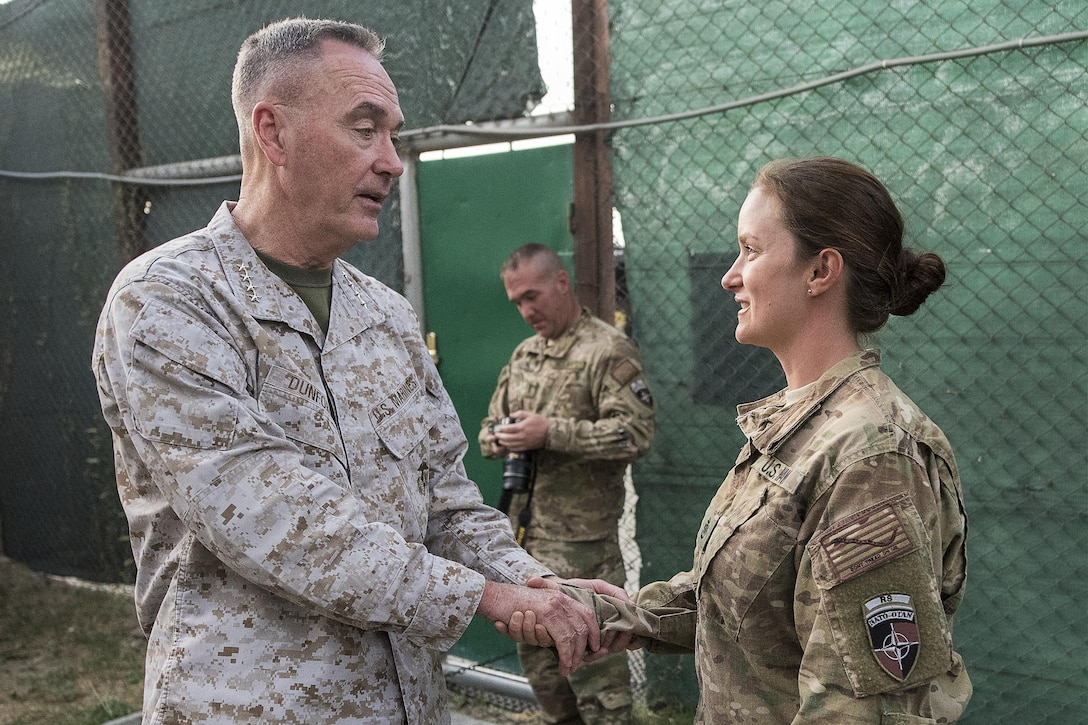 Marine Corps Gen. Joe Dunford, chairman of the Joint Chiefs of Staff, greets Navy Chief Petty Officer Mel Rowe in Kabul, Afghanistan, July 15, 2016. DoD photo by Navy Petty Officer 2nd Class Dominique A. Pineiro