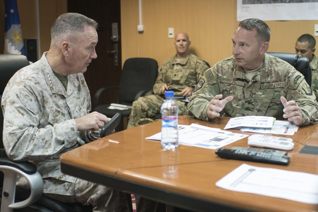 Marine Corps Gen. Joe Dunford, chairman of the Joint Chiefs of Staff, meets with Air Force Brig. Gen. David W. Hicks, commanding general of Train, Advise, Assist Command – Air, in Kabul, Afghanistan, July 16, 2016. Dunford met with key leaders and received briefings about the progress of the Afghan air force and its partnership with the command while assessing the Resolute Support mission in Afghanistan. DoD photo by Navy Petty Officer 2nd Class Dominique A. Pineiro