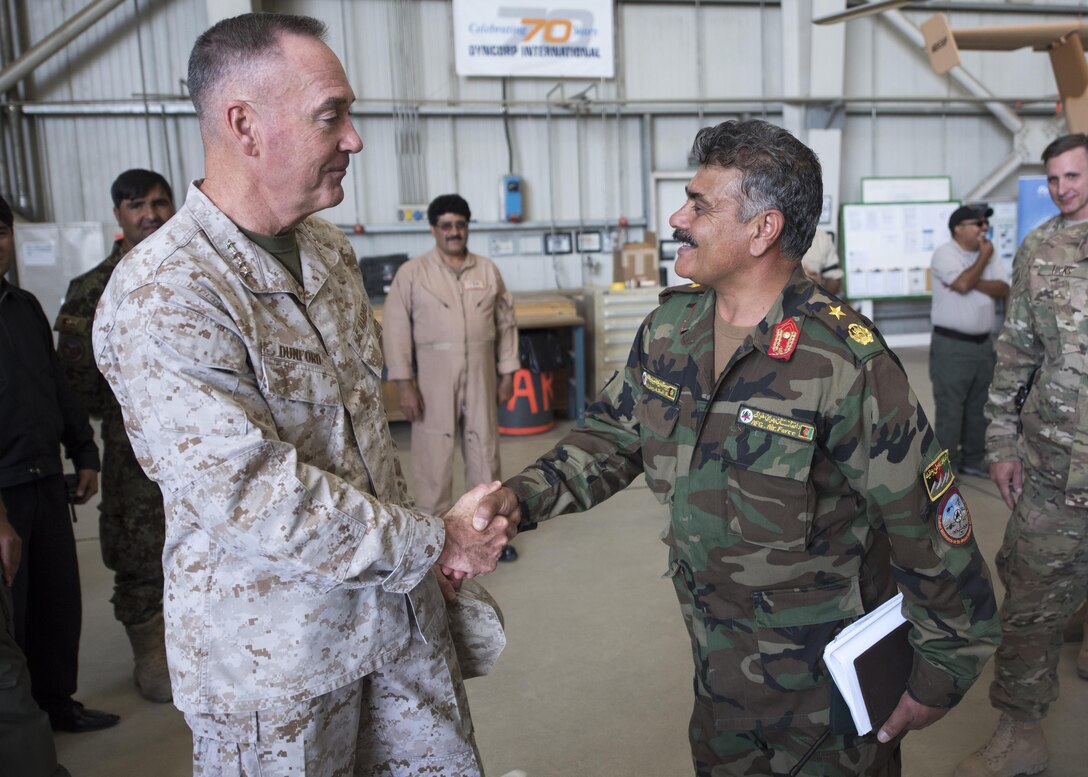 Marine Corps Gen. Joe Dunford, chairman of the Joint Chiefs of Staff, meets with Afghan air force Brig. Gen. Eng A. Shafi during an assessment of Train, Advise, Assist Command – Air in Kabul, Afghanistan, July 16, 2016. DoD photo by Navy Petty Officer 2nd Class Dominique A. Pineiro