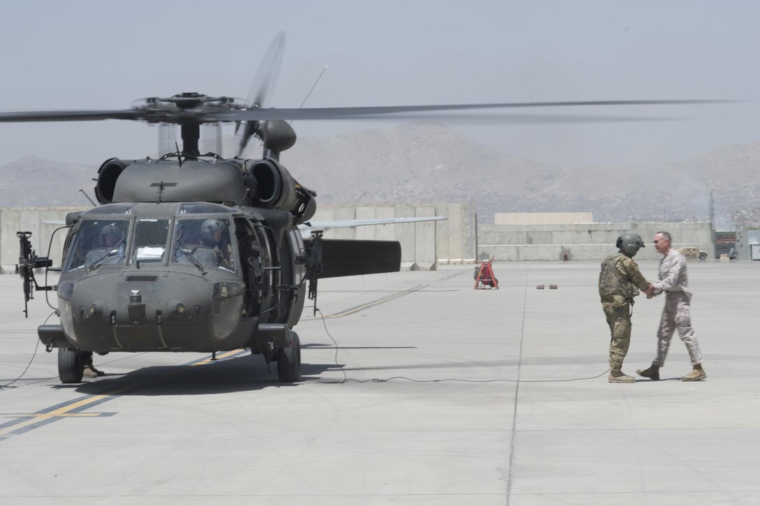 Marine Corps Gen. Joe Dunford, chairman of the Joint Chiefs of Staff, prepares to depart after meeting with members of Train, Advise, Assist Command – Air in Kabul, Afghanistan, July 16, 2016. DoD photo by Navy Petty Officer 2nd Class Dominique A. Pineiro