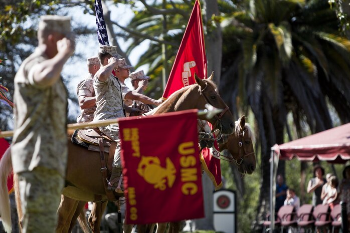 A U.S. Marine Corps mounted color guard presents the colors during a change of command ceremony for Marine Corps Installations West-Marine Corps Base, Camp Pendleton, at the Santa Margarita Ranch House National Historic Site on Camp Pendleton, Calif., July 15, 2016. (U.S. Marine Corps photo by Cpl. Brian D. Bekkala)