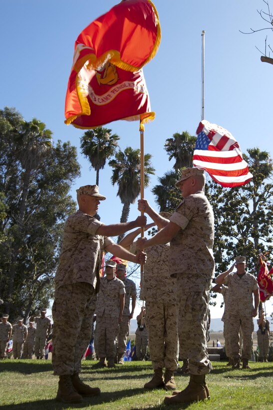 U.S. Marine Corps Brig. Gen. Edward D. Banta, right, commanding general, Marine Corps Installations West-Marine Corps Base, Camp Pendleton, relinquishes his command by the passing of the colors to U.S. Marine Corps Brig. Gen. Kevin J. Killea during their change of command ceremony at the Santa Margarita Ranch House National Historic Site on Camp Pendleton, Calif., July 15, 2016. (U.S. Marine Corps photo by Cpl. Brian D. Bekkala)