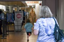 U.S. Air Force Airmen from the 343rd Bomb Squadron are welcomed home by their families after returning from a deployment at Shreveport Regional Airport in Louisiana on July 16, 2016. The 343rd deployed with their TFI counterparts from the 2nd Bomb Wing in support of Operation Inherent Resolve. The B-52 Stratofortress’ joined the 19-nation air coalition in April and are conducting missions in the region to include those to eliminate the Islamic State of Iraq and the Levant terrorist group. (U.S. Air Force photo by Master Sgt. Dachelle Melville/Released)