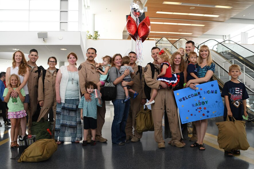U.S. Air Force Airmen from the 343rd Bomb Squadron are welcomed home by their families after returning from a deployment at Shreveport Regional Airport in Louisiana on July 16, 2016. The 343rd deployed with their TFI counterparts from the 2nd Bomb Wing in support of Operation Inherent Resolve. The B-52 Stratofortress’ joined the 19-nation air coalition in April and are conducting missions in the region to include those to eliminate the Islamic State of Iraq and the Levant terrorist group. (U.S. Air Force photo by Master Sgt. Dachelle Melville/Released)