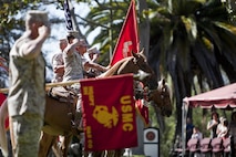 A U.S. Marine Corps mounted color guard presents the colors during a change of command ceremony for Marine Corps Installations West-Marine Corps Base, Camp Pendleton, at the Santa Margarita Ranch House National Historic Site on Camp Pendleton, Calif., July 15, 2016. (U.S. Marine Corps photo by Cpl. Brian D. Bekkala)