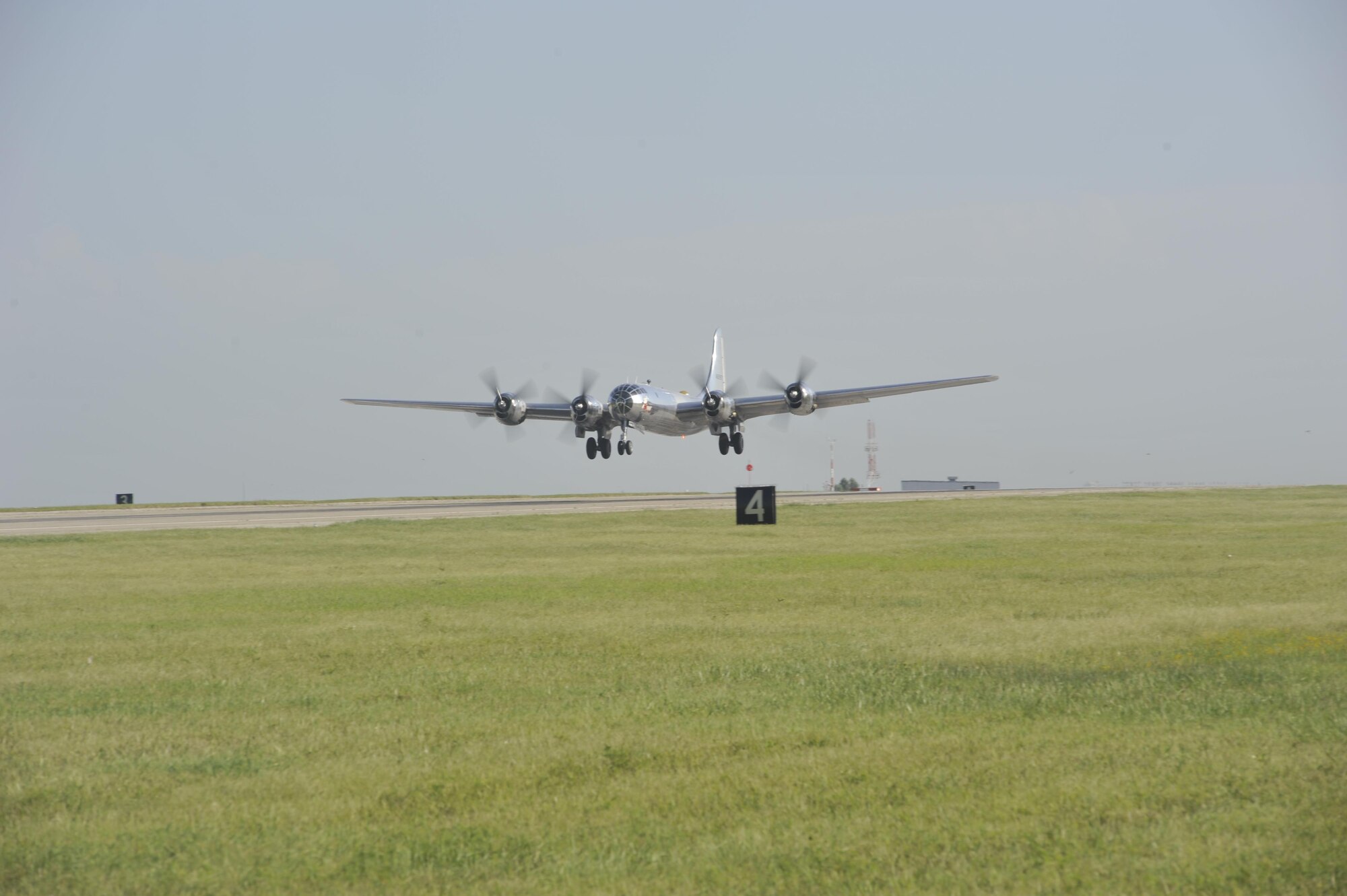 A B-29 Superfortress, known as ‘Doc,’ takes off for the first time in approximately 60 years, July 17, 2016, at McConnell Air Force Base, Kan. A restoration team worked on the aircraft for the last 16 years to prepare it for flight. (U.S Air Force photo/)