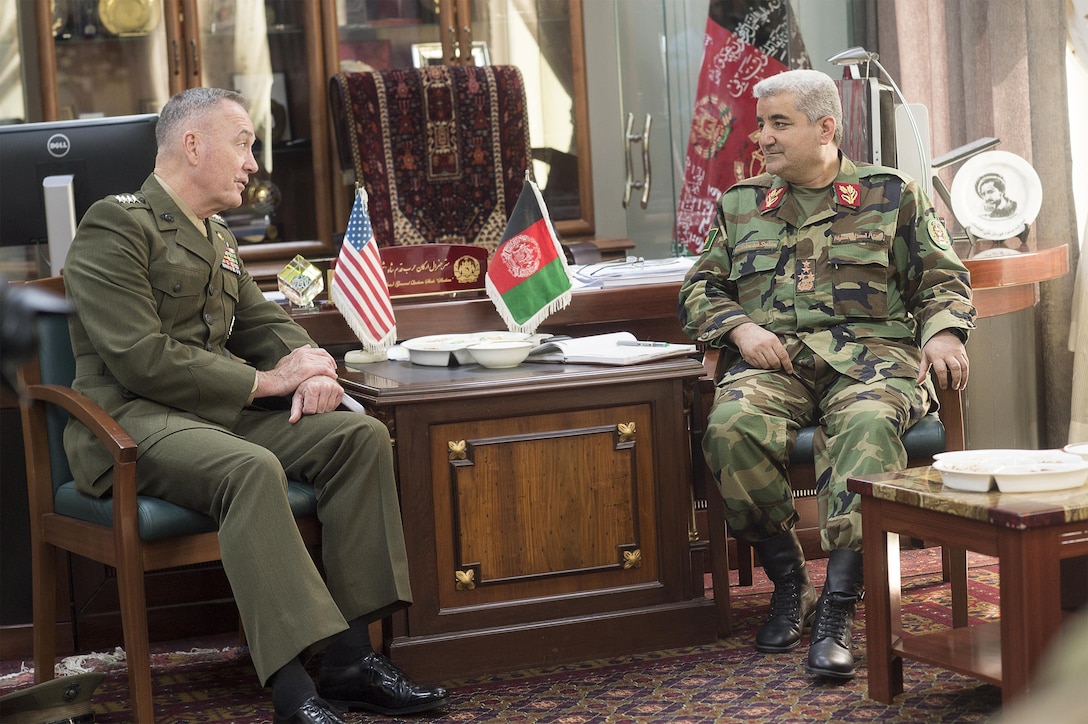 Marine Corps Gen. Joe Dunford, chairman of the Joint Chiefs of Staff, meets with Afghan Gen. Qadam Shah Shahim, Afghanistan’s chief of defense, at the Ministry of Defense in Kabul, Afghanistan, July 17, 2016. DoD photo by Navy Petty Officer 2nd Class Dominique A. Pineiro