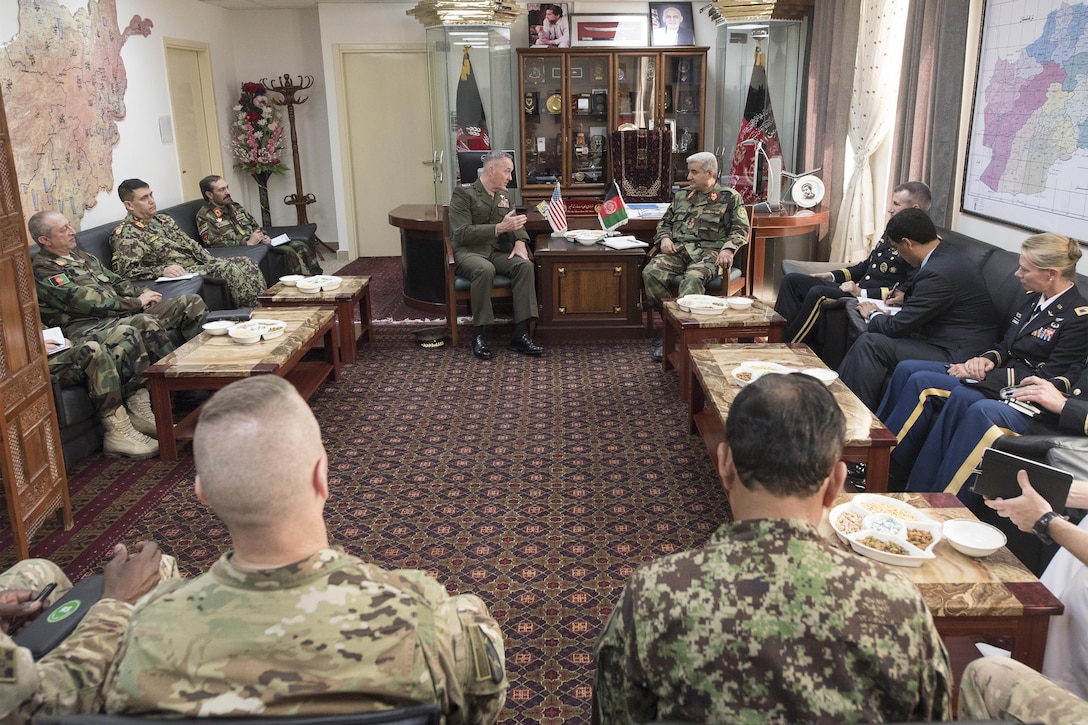 Marine Corps Gen. Joe Dunford, chairman of the Joint Chiefs of Staff, meets with Afghan Gen. Qadam Shah Shahim, Afghanistan’s chief of defense, at the Ministry of Defense in Kabul, Afghanistan, July 17, 2016. DoD photo by Navy Petty Officer 2nd Class Dominique A. Pineiro