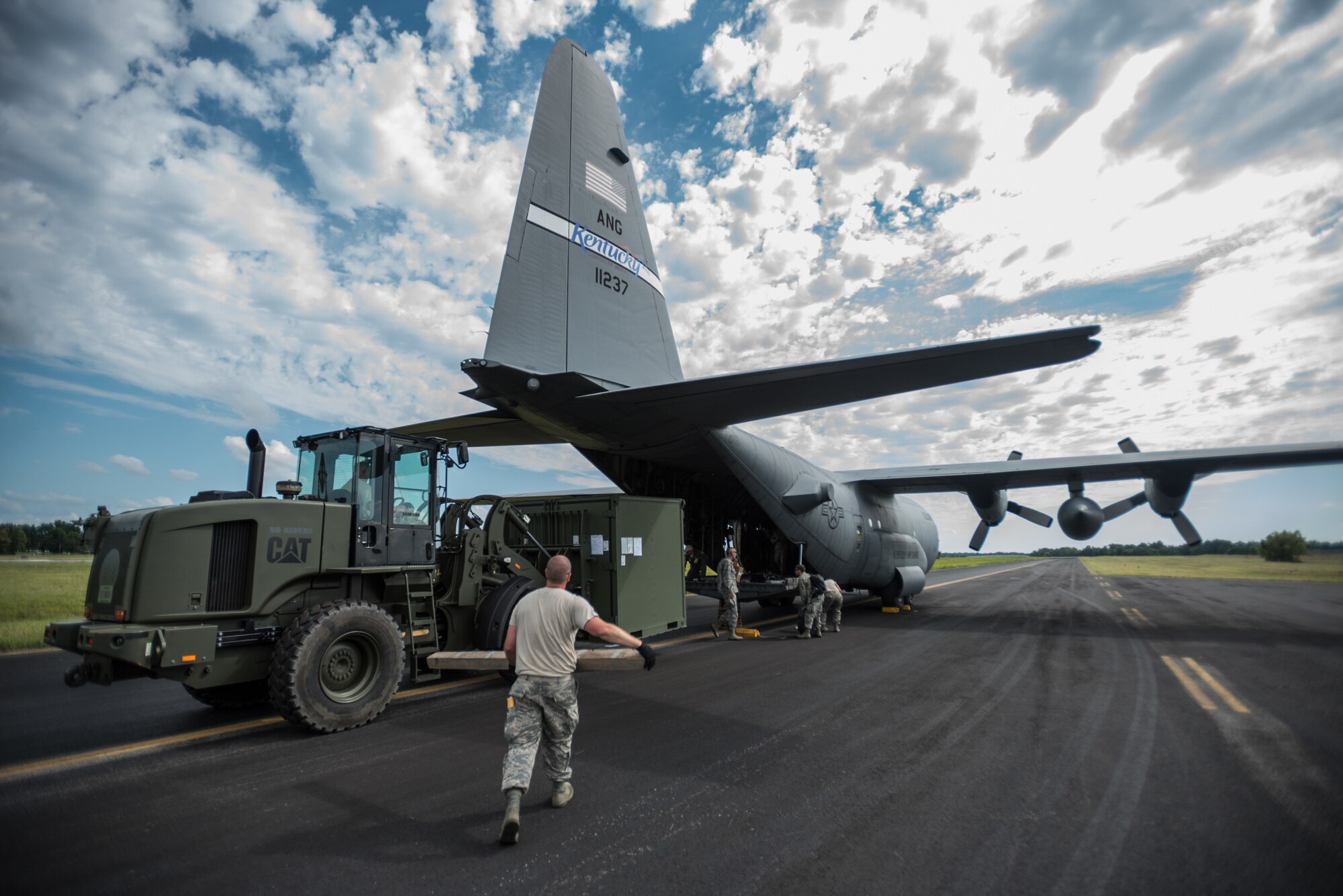 Members of the Kentucky Air National Guard’s 123rd Airlift Wing unload a container of medical equipment from a C-130 Hercules at Barkley Regional Airport in Paducah, Ky., July 13, 2016, in preparation for Bluegrass Medical Innovative Readiness Training. The program will offer medical and dental care at no cost to residents in three Western Kentucky locations from July 18 to 27. (U.S. Air National Guard photo by Master Sgt. Phil Speck)