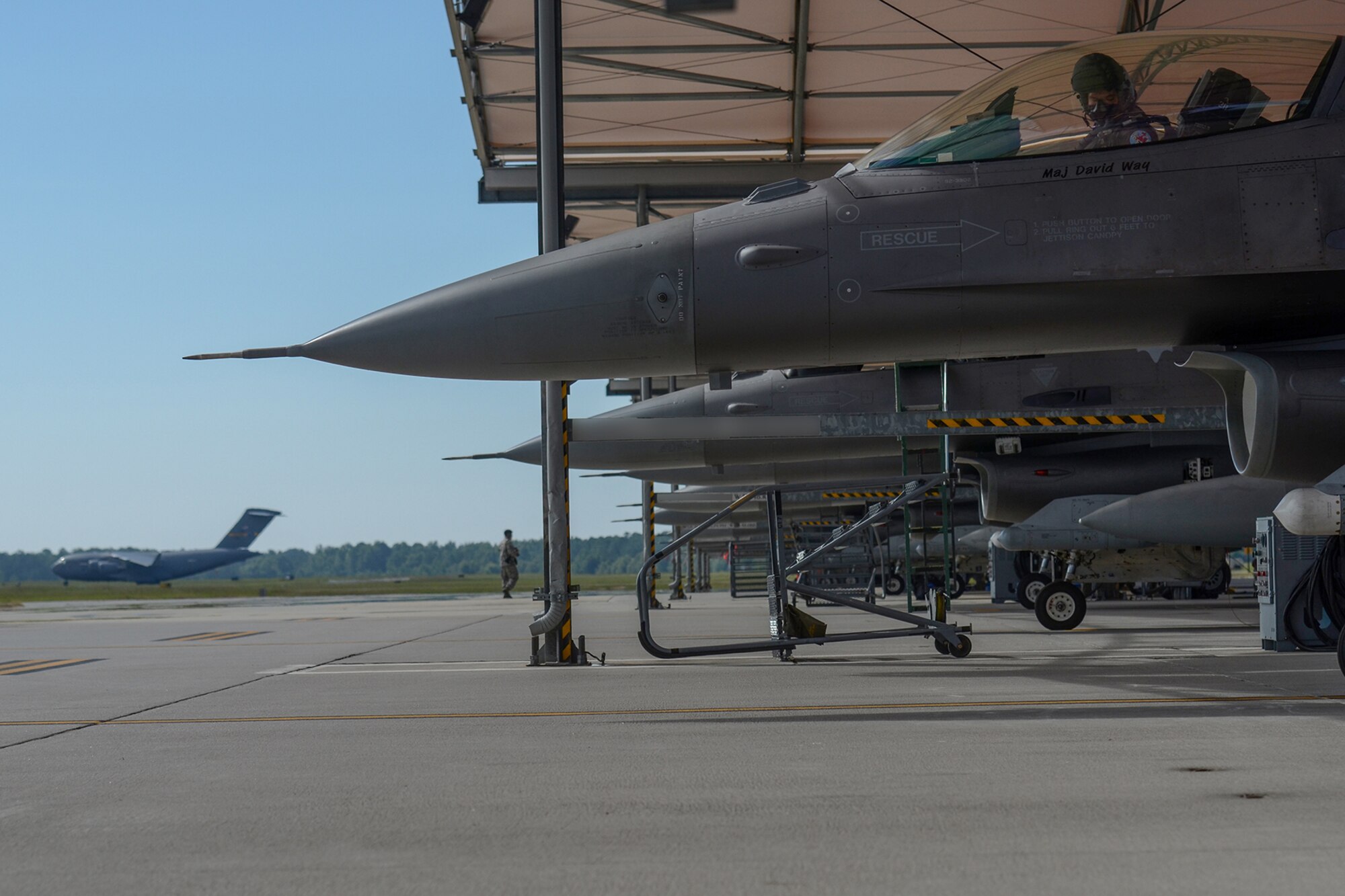 U.S. Air Force Capt. Mark Fattman, an F-16 fighter pilot assigned to the 169th Fighter Wing, South Carolina Air National Guard, performs a pre-flight inspection at Mc McEntire Joint National Guard Base, S.C., July 11, 2016. Approximately 300 U.S. Airmen and 12 F-16 Fighting Falcon jets from the 169th Fighter Wing at McEntire JNGB, S.C., are deploying to Osan Air Base, Republic of Korea, as the 157th Expeditionary Fighter Squadron in support of the U.S. Pacific Command Theater Security Package. (U.S. Air National Guard photo by Airman 1st Class Megan Floyd)