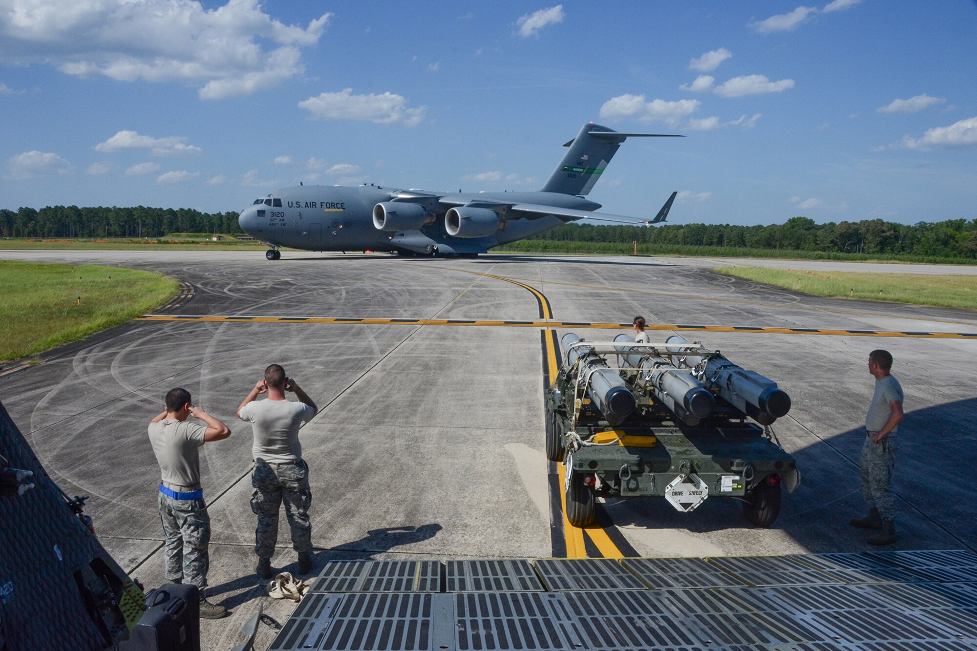 A U.S. Air Force Boeing C-17 Globemaster III transport aircraft taxis to the runway at McEntire Joint National Guard Base, S.C., July 8, 2016. Approximately 300 U.S. Airmen and 12 F-16 Fighting Falcon jets from the 169th Fighter Wing at McEntire JNGB, S.C., are deploying to Osan Air Base, Republic of Korea, as the 157th Expeditionary Fighter Squadron in support of the U.S. Pacific Command Theater Security Package. (U.S. Air National Guard photo by Airman 1st Class Megan Floyd)