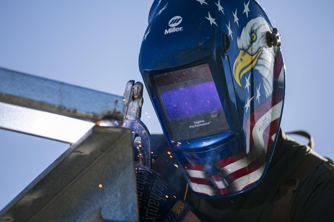 U.S. Marine Lance Cpl. Jamest J. Tedder, metal worker with Task Force Koa Moana 16.2, conducts vertical construction training at Ovalau, Fiji, July 12, 2016. Fiji is part of Task Force Koa Moana’s deployment throughout the Asia-Pacific region where Marines and Sailors will share engineering and infantry skills with the Republic of Fiji Military Forces to strengthen mil-to-mil relationships and interoperability. (U.S. Marine Corps imagery by MCIPAC Combat Camera Lance Cpl. Jesus McCloud/ Released)