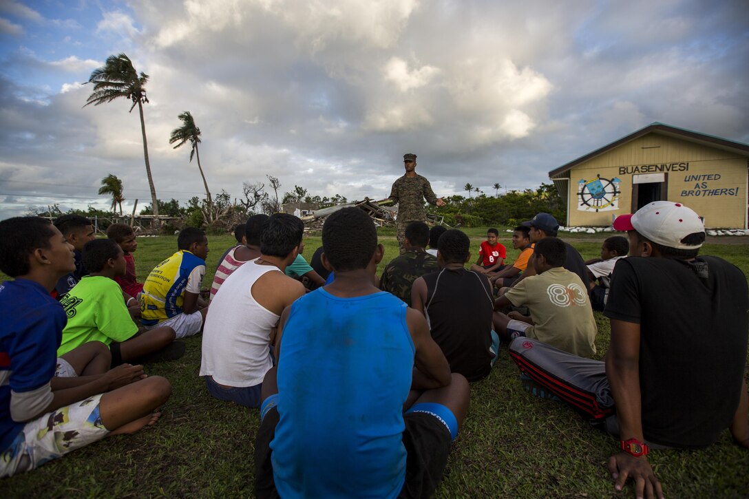 U.S. Navy Petty Officer 2nd Class Corey J. Buchanan, Hospital Corpsman with Task Force Koa Moana 16.2, leads small instructions on general health and wellness to local youth at St. John’s College, Ovalau, Fiji, July 12, 2016. Fiji is part of Task Force Koa Moana’s deployment throughout the Asia-Pacific region where Marines and Sailors will share engineering and infantry skills with the Republic of Fiji Military Forces to strengthen mil-to-mil relationships and interoperability. (U.S. Marine Corps imagery by MCIPAC Combat Camera Lance Cpl. Jesus McCloud/ Released)