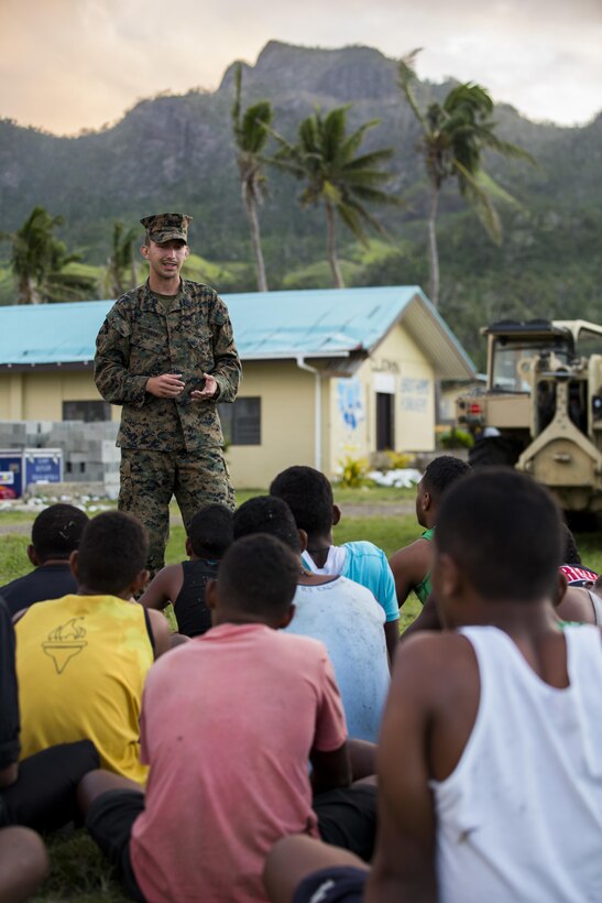 U.S. Navy Hospitalman John J. Bustamante, Preventive Medicine Technician with Task Force Koa Moana 16.2, leads small instructions on general health and wellness to local youth at St. John’s College, Ovalau, Fiji, July 12, 2016. Fiji is part of Task Force Koa Moana’s deployment throughout the Asia-Pacific region where Marines and Sailors will share engineering and infantry skills with the Republic of Fiji Military Forces to strengthen mil-to-mil relationships and interoperability. (U.S. Marine Corps imagery by MCIPAC Combat Camera Lance Cpl. Jesus McCloud/ Released)