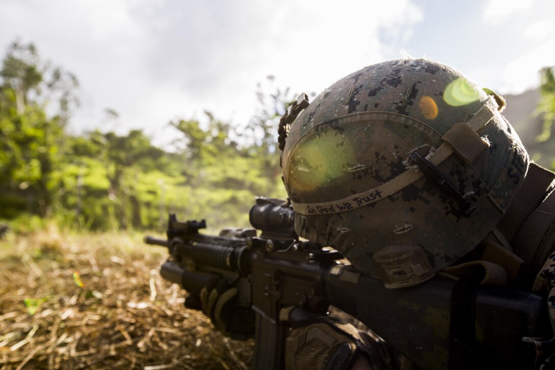 U.S. Marine Lance Cpl. Nathan H. Steed with Task Force Koa Moana 16.2 fires rounds down range while conducting integrated fire-team buddy rushes with Soldiers from the Republic of Fiji Military Forces on Ovalau, Fiji, July 13, 2016. Fiji is part of Task Force Koa Moana’s deployment throughout the Asia- Pacific region, where Marines and Sailors will share engineering and infantry skills with the RFMF to strengthen mil-to-mil relationships and interoperability. (U.S. Marine Corps imagery by MCIPAC Combat Camera Lance Cpl. Jesus McCloud/ Released)