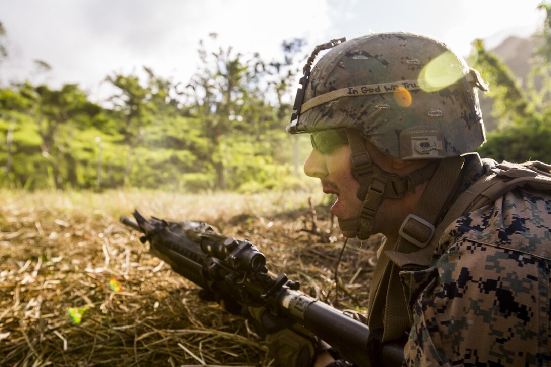 U.S. Marine Lance Cpl. Nathan H. Steed with Task Force Koa Moana 16.2 fires rounds down range while conducting integrated fire-team buddy rushes with Soldiers from the Republic of Fiji Military Forces on Ovalau, Fiji, July 13, 2016. Fiji is part of Task Force Koa Moana’s deployment throughout the Asia- Pacific region, where Marines and Sailors will share engineering and infantry skills with the RFMF to strengthen mil-to-mil relationships and interoperability. (U.S. Marine Corps imagery by MCIPAC Combat Camera Lance Cpl. Jesus McCloud/ Released)