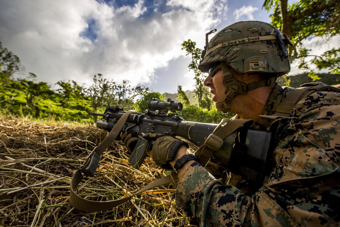 U.S. Marine Lance Cpl. Nathan H. Steed with Task Force Koa Moana 16.2 fires rounds down range while conducting integrated fire-team buddy rushes with Soldiers from the Republic of Fiji Military Forces on Ovalau, Fiji, July 13, 2016. Fiji is part of Task Force Koa Moana’s deployment throughout the Asia- Pacific region, where Marines and Sailors will share engineering and infantry skills with the RFMF to strengthen mil-to-mil relationships and interoperability. (U.S. Marine Corps imagery by MCIPAC Combat Camera Lance Cpl. Jesus McCloud/ Released)