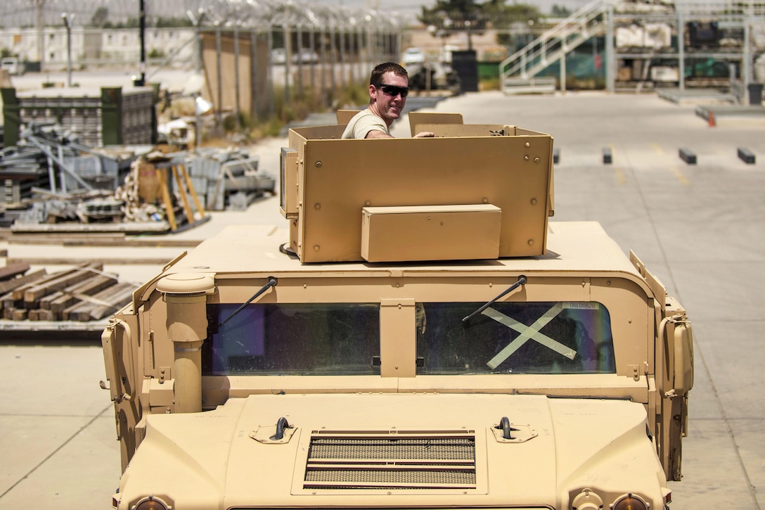 Air Force Staff Sgt. Mark Wolford sits in a turret on a Humvee at Bagram Airfield, Afghanistan, July 14, 2016. Wolford is a material recovery specialist assigned to the 455th Expeditionary Logistics Readiness Squadron Central Command. Air Force photo by Senior Airman Justyn M. Freeman