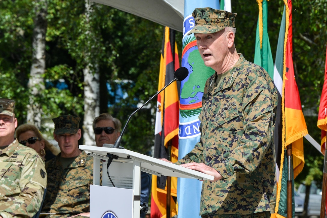 Marine Corps Gen. Joe Dunford, chairman of the Joint Chiefs of Staff, speaks at the U.S. Africa Command change-of-command ceremony at U.S. Army Garrison Stuttgart, Germany, July 18, 2016. Army Gen. David M. Rodriguez, who will retire after 40 years of military service, relinquished command to Marine Corps Gen. Thomas D. Waldhauser. DoD by Adam Sanders