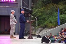 Col. Colin Connor, 91st Missile Wing commander, speaks during a veteran event at the Medora Musical in Medora, N.D., July 10, 2016. The event, hosted by the Theodore Roosevelt Medora Foundation, featured a welcoming social, flag ceremony, aircraft flyovers and free admittance to the musical. During his speech, the commander thanked the near 500 veterans in attendance and spoke about how the 91st MW Airmen uphold the Teddy Roosevelt Roughriders’ namesake in their daily mission. (Courtesy photos)