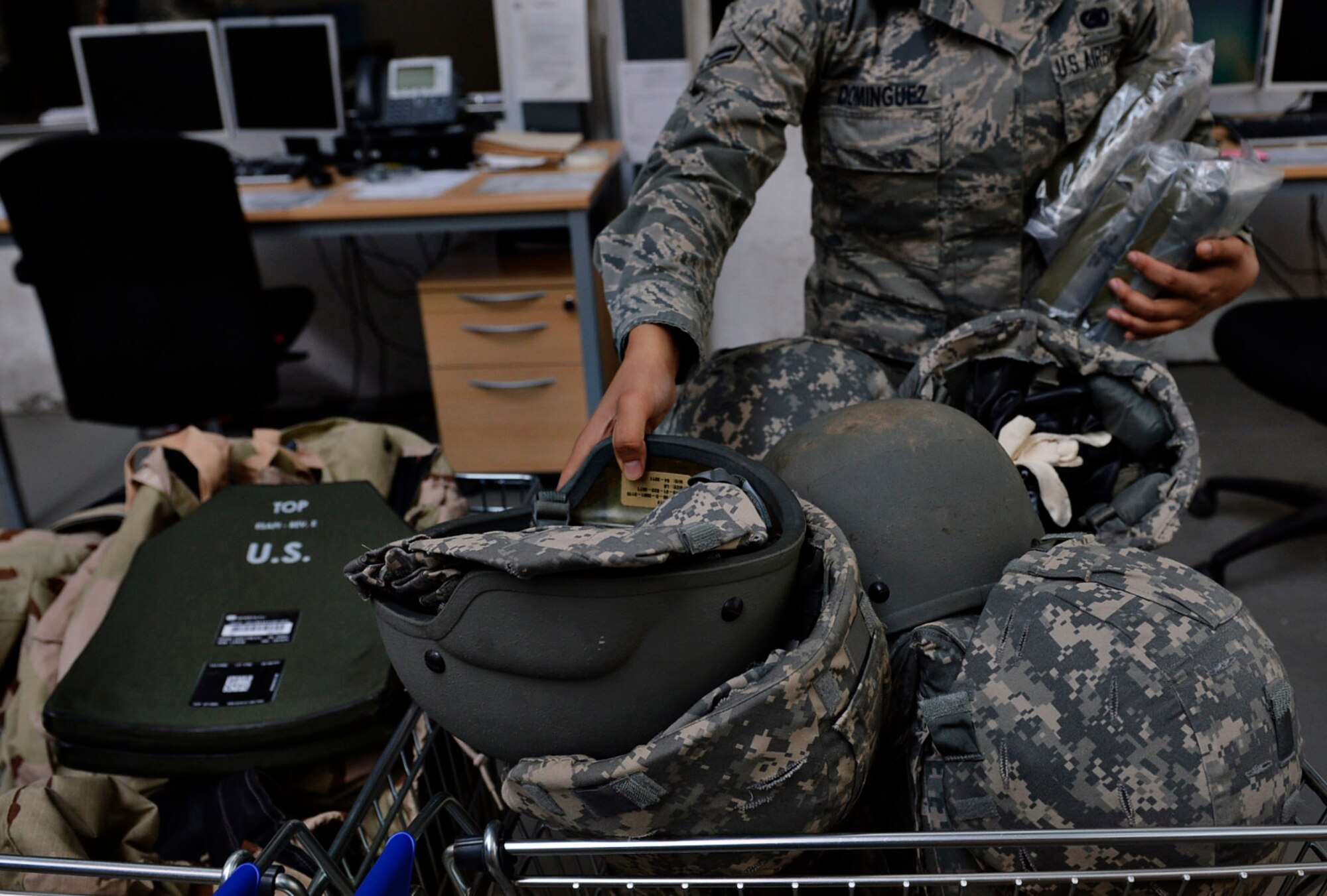 Senior Airman Cierra Dominguez, 86th Logistics Readiness Squadron individual protective equipment journeyman, puts away equipment at Ramstein Air Base, Germany, July 15, 2016. In addition to supporting the Kaiserslautern Military Community, the 86th LRS armory assists partner nations, Slovakia, Romania and Belgium by housing their weapons. (U.S. Air Force photo/ Senior Airman Nesha Humes)