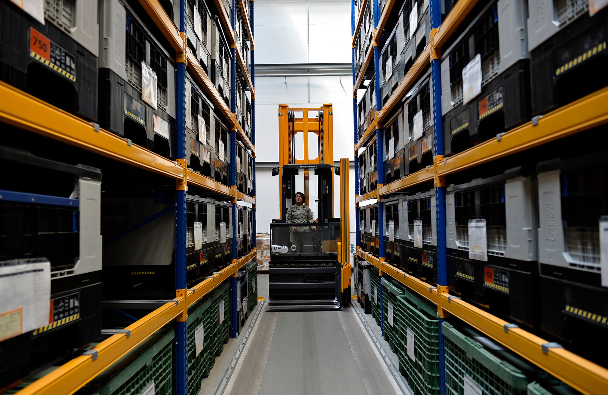Senior Airman Cierra Dominguez, 86th Logistics Readiness Squadron individual protective equipment journeyman, operates material handling equipment at Ramstein Air Base, Germany, July 15, 2016. The IPE element supports approximately 143 units around the Kaiserslautern Military Community. (U.S. Air Force photo/ Senior Airman Nesha Humes)