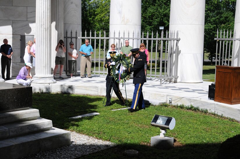 MARION, Ohio (July 16, 2016) – Brig. Gen. Stephen E. Strand, deputy commanding general, 88th Regional Support Command, and Chap. (Capt.) Jonathan Anderson, 643rd Regional Support Group chaplain, place the wreath at the foot of the gravesites for 29th President of the United States Warren G. Harding and his wife Florence during the ceremony at the Harding Memorial in Marion, Ohio, July 16, 2016.