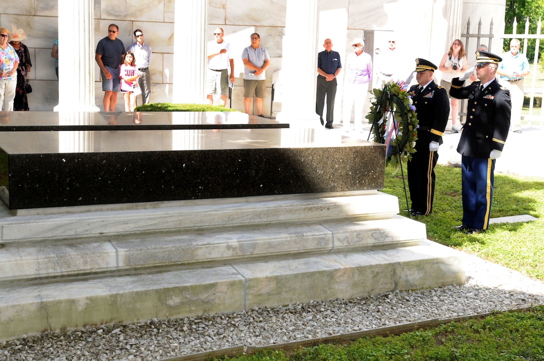 MARION, Ohio (July 16, 2016) – Brig. Gen. Stephen E. Strand, deputy commanding general, 88th Regional Support Command, and Chap. (Capt.) Jonathan Anderson, 643rd Regional Support Group chaplain, salute as Taps is played by Staff Sgt. David Lambermont, 338th Army Band bugler, during the wreathlaying ceremony at the Harding Memorial in Marion, Ohio, July 16, 2016.