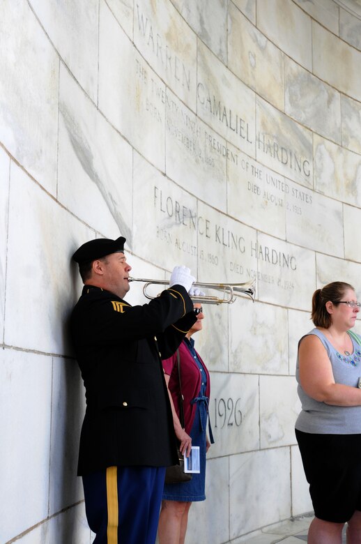 MARION, Ohio (July 16, 2016) – Staff Sgt. David Lambermont, 338th Army Band bugler, plays taps during the Presidential Memorial Wreathlaying Ceremony for President Warren G. Harding at the Harding Memorial in Marion, Ohio, July 16, 2016.