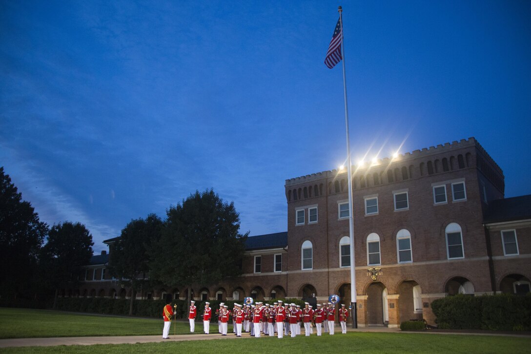 The United States Marine Band performs during the Evening Parade at Marine Barracks Washington, D.C., July 15, 2016. The guest of honor for the parade was the Honorable John Cornyn, United States Senator for Texas, and the hosting official was Gen. Robert Neller, commandant of the Marine Corps. (Official Marine Corps photo by Lance Cpl. Robert Knapp/Released)